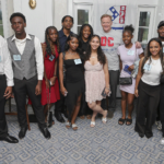 A photo of NFL Commissioner Roger Goodell with Destination: College student-athletes and 2025 Cooney Scholars at the Destination: College 2025 fundraiser Best Night of The Year