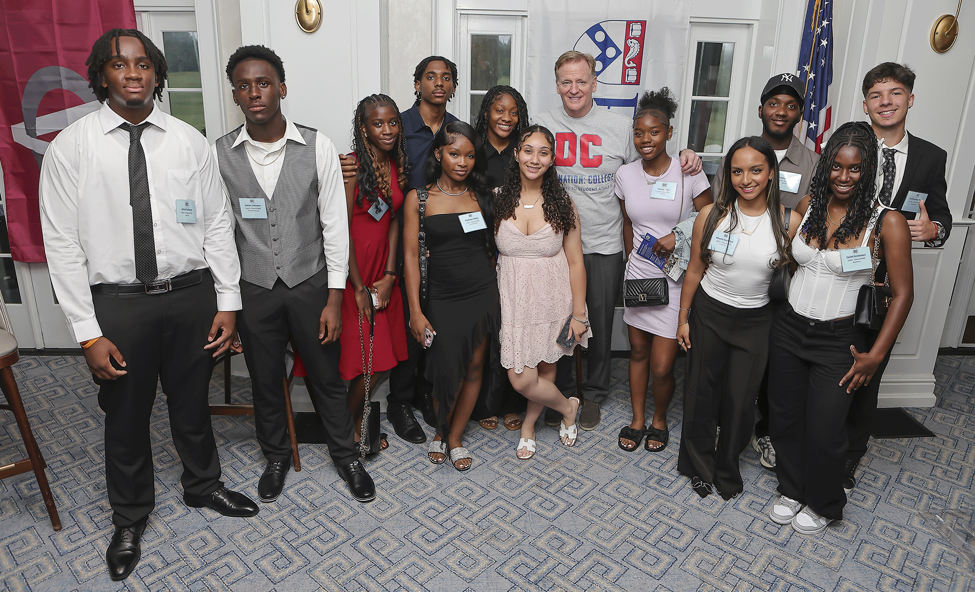 A photo of NFL Commissioner Roger Goodell with Destination: College student-athletes and 2025 Cooney Scholars at the Destination: College 2025 fundraiser Best Night of The Year